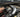 a diesel truck engine bay with an EGR valve and a DPF pipe